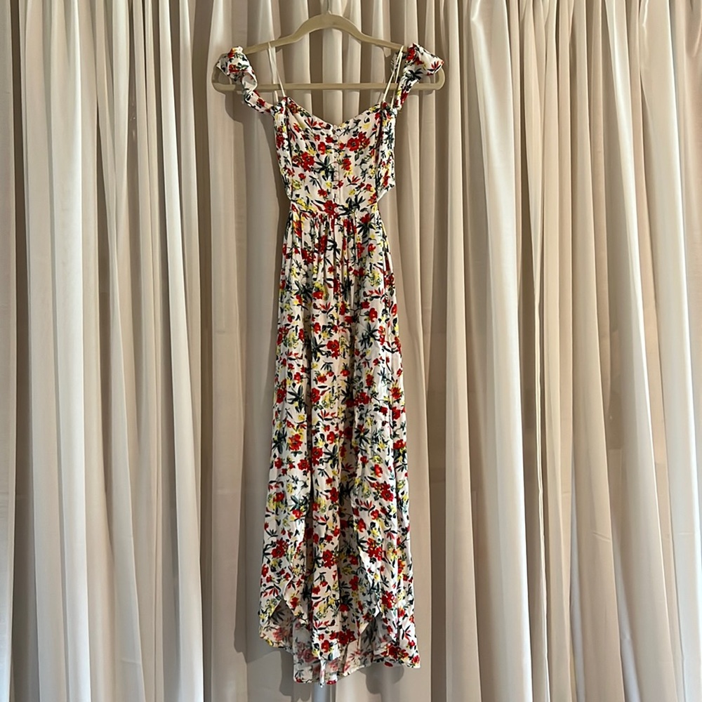 Lulus floral dress with off shoulder straps and side cut-outs.